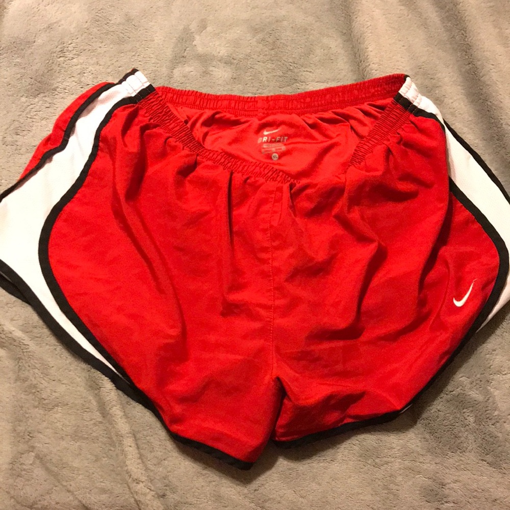 Red Nike shorts